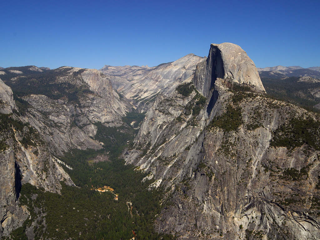 Yosemite Valley, where glaciers and river erosion have exposed part of a huge granitic batholith.